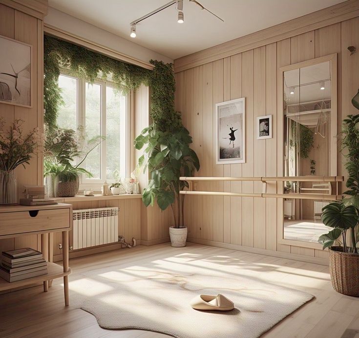 Warm wooden room with barre, plants, and mirror